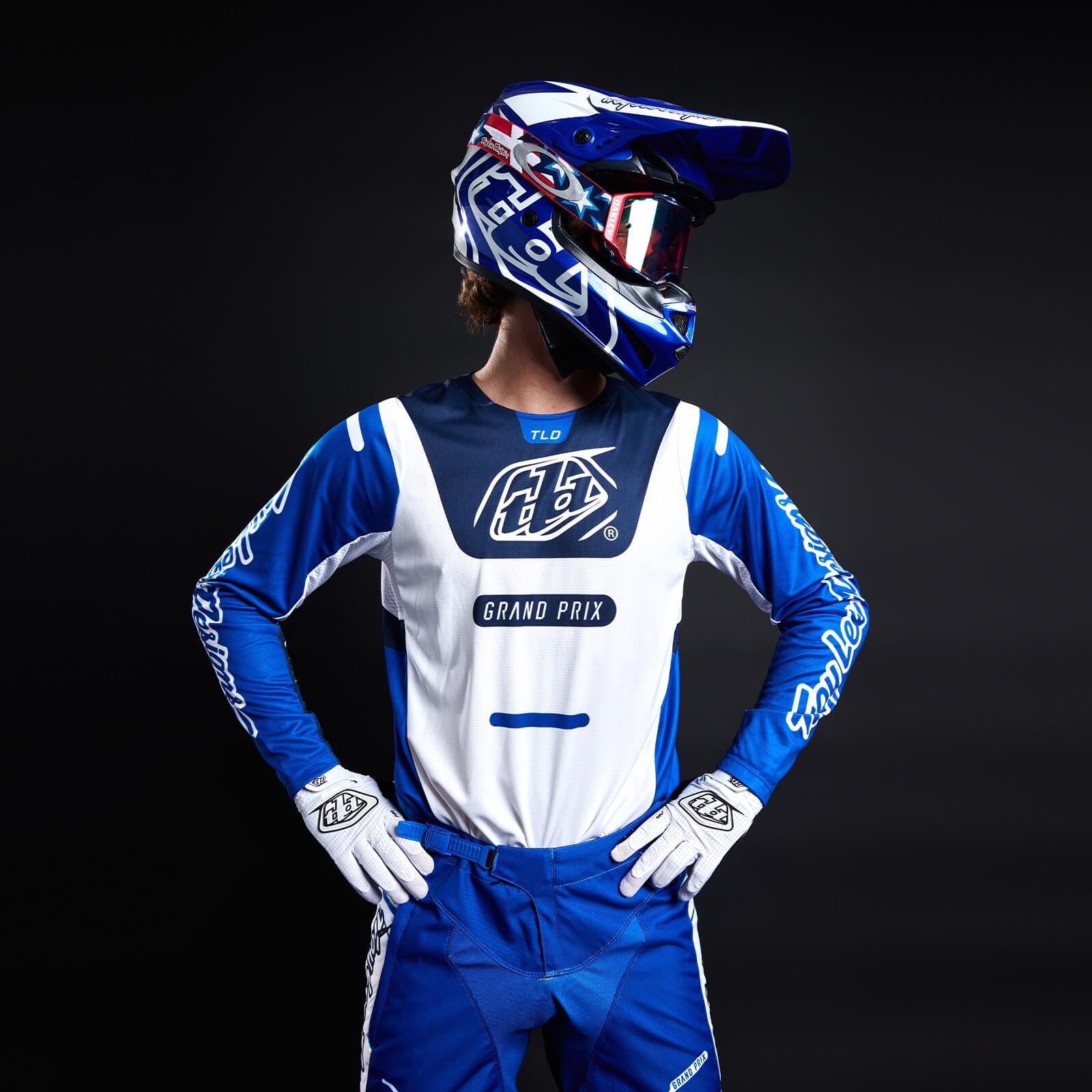 Troy Lee Designs GP Pro Moto gear rider against a backdrop
