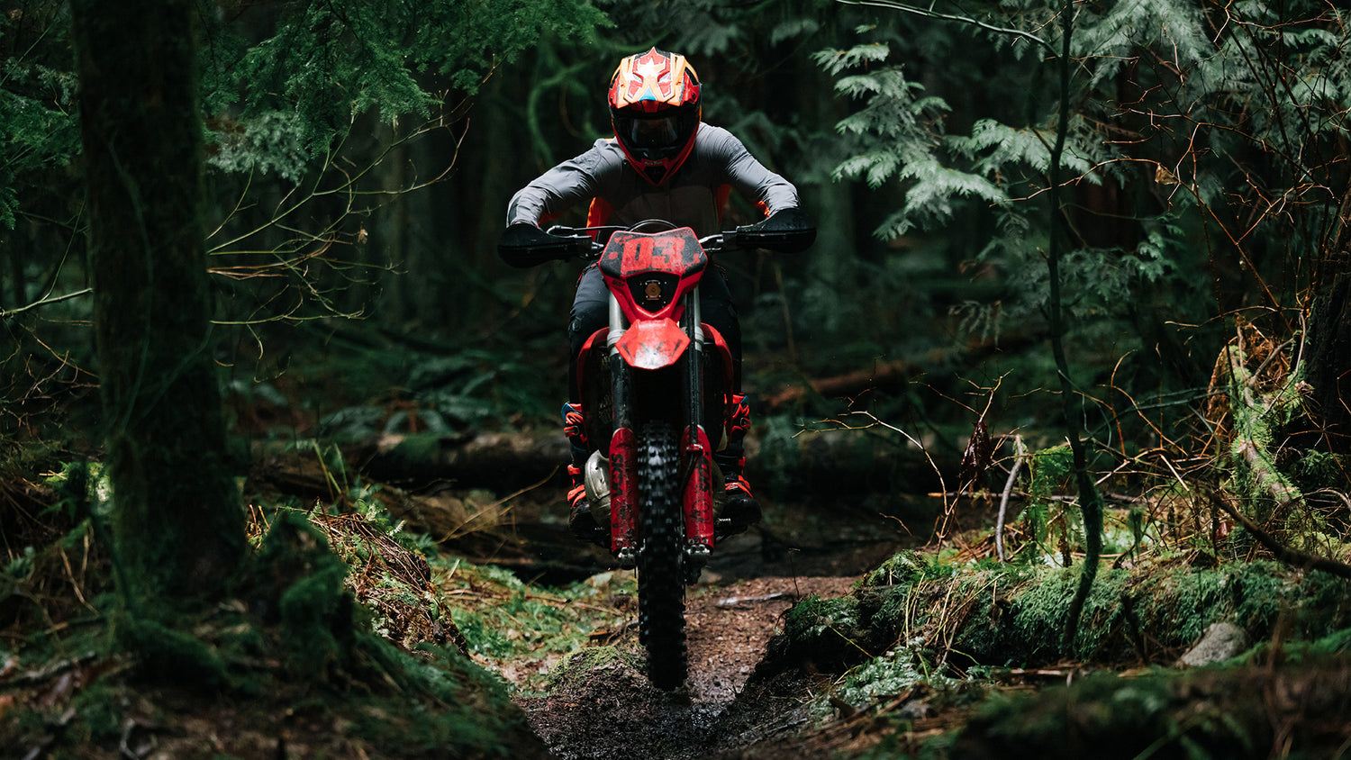 Motocross rider in the forest, wearing Scout SE gear