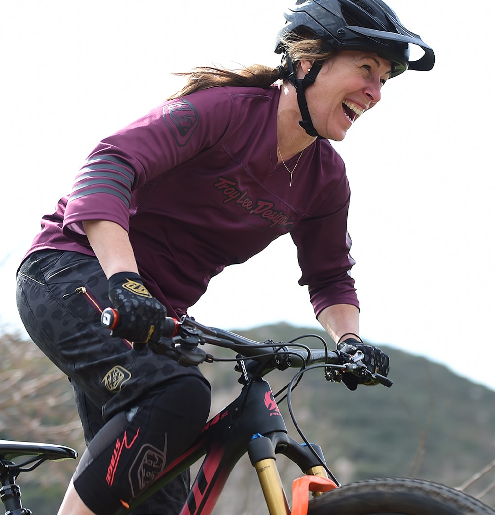 TLD - Female riding the trail.