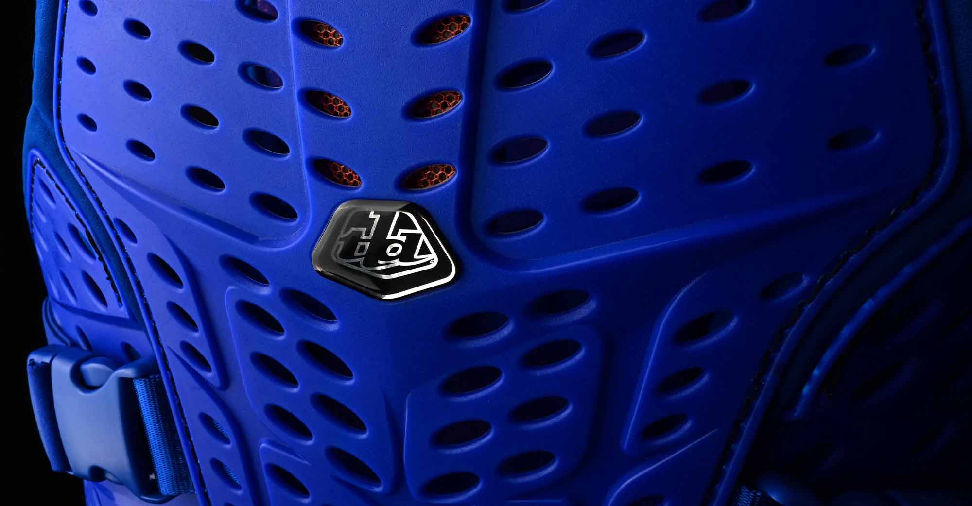 TLD - Rockfight chest protection closeup of blue tld logo